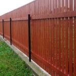 Защита от дървена ограда