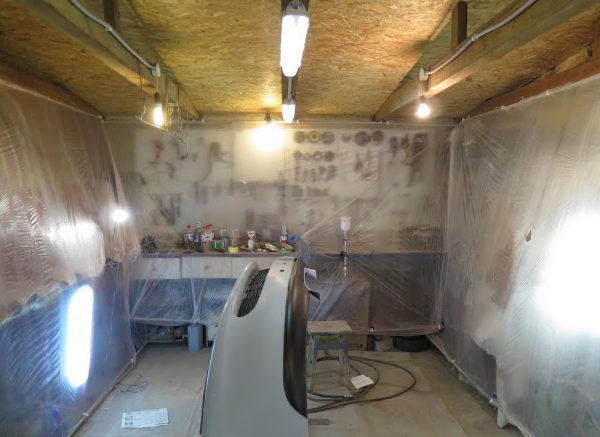 Disposição da cabine de pintura na garagem