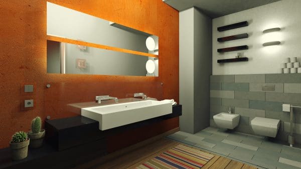 Pilkai oranžinis vonios kambarys
