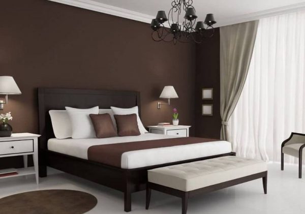 Design av et soverom laget i mørkebrune nyanser