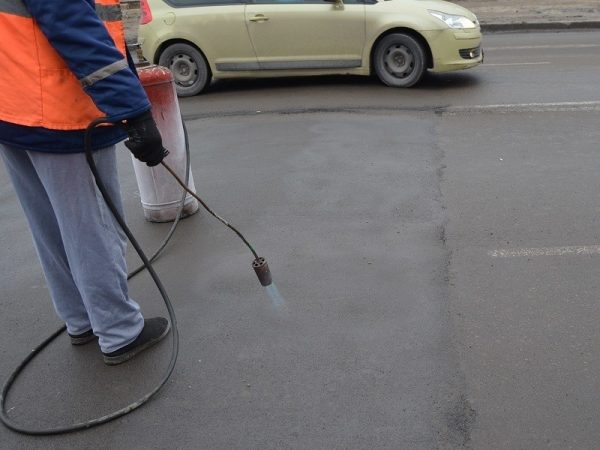 Aquecimento do asfalto antes da marcação