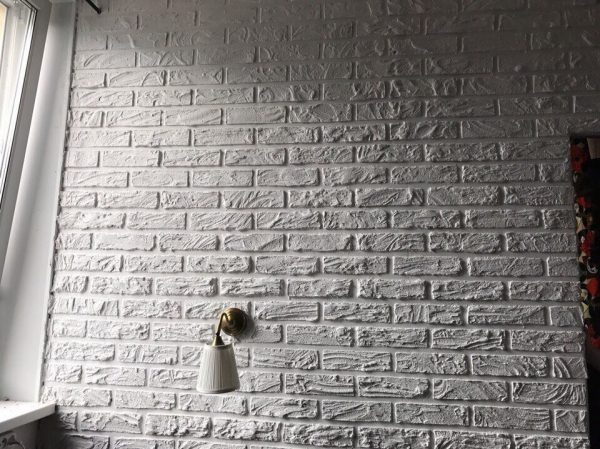 Mur enduit de brique